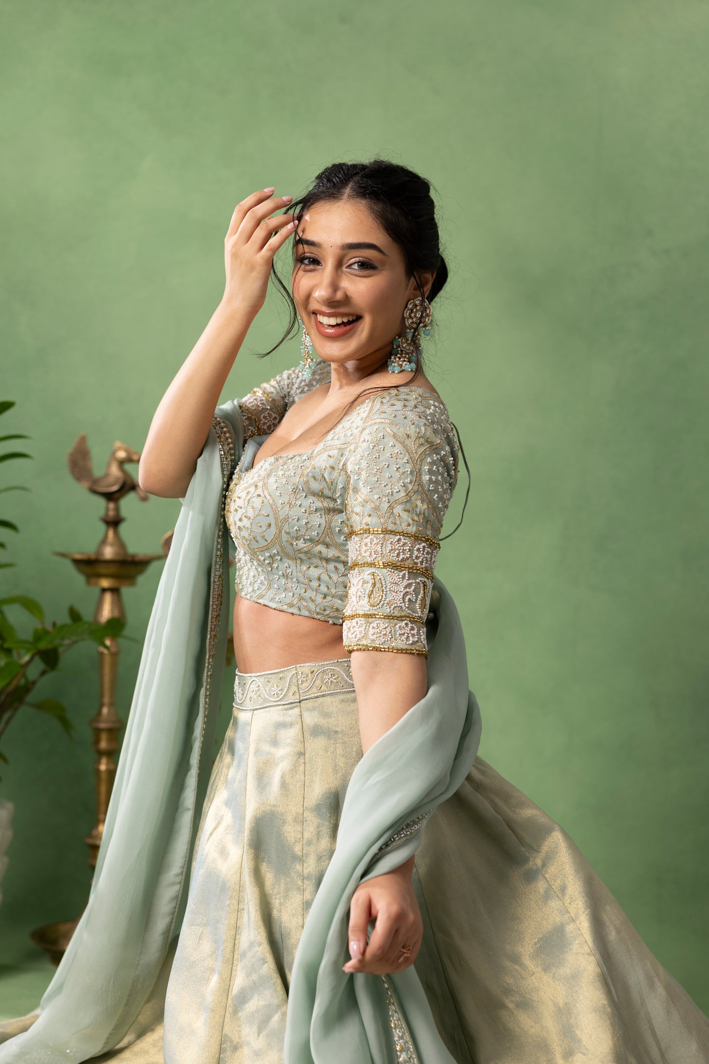 Mint Green Hand-Embroidered Blouse with Ivory Lehenga & Dupatta