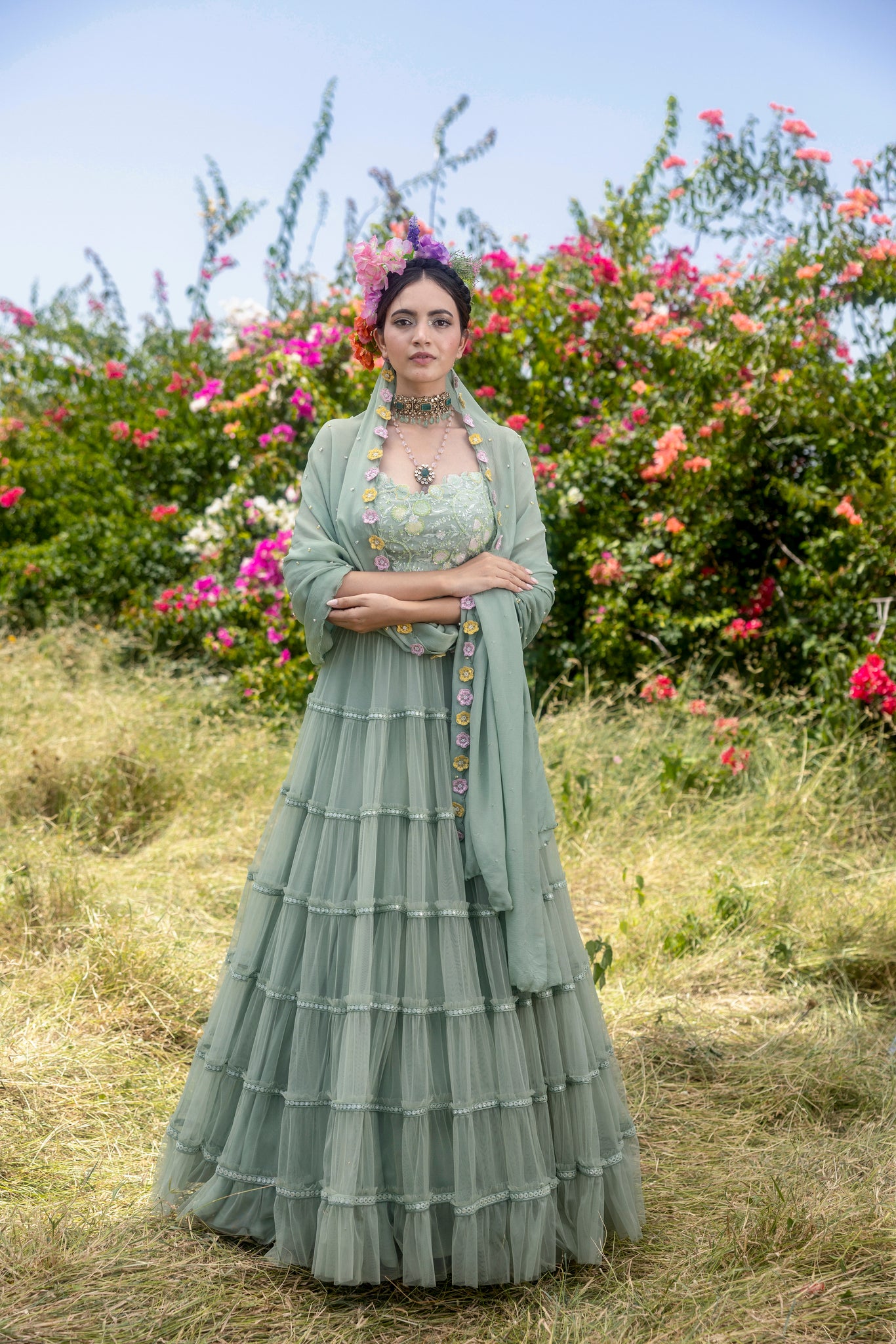 Organza hand embroidered blouse with layered net skirt and hand embroidered shiffon dupatta
