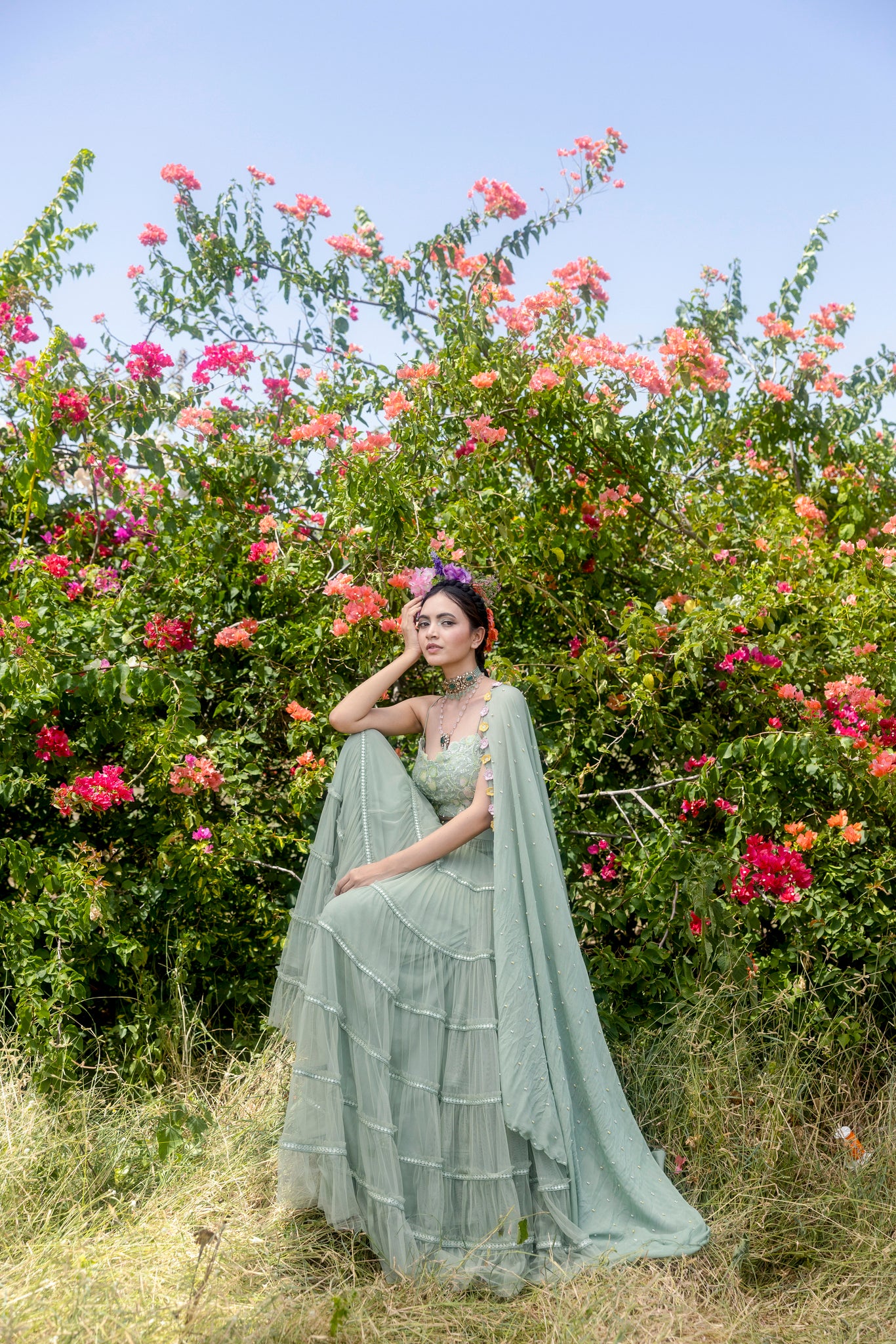 Organza hand embroidered blouse with layered net skirt and hand embroidered shiffon dupatta