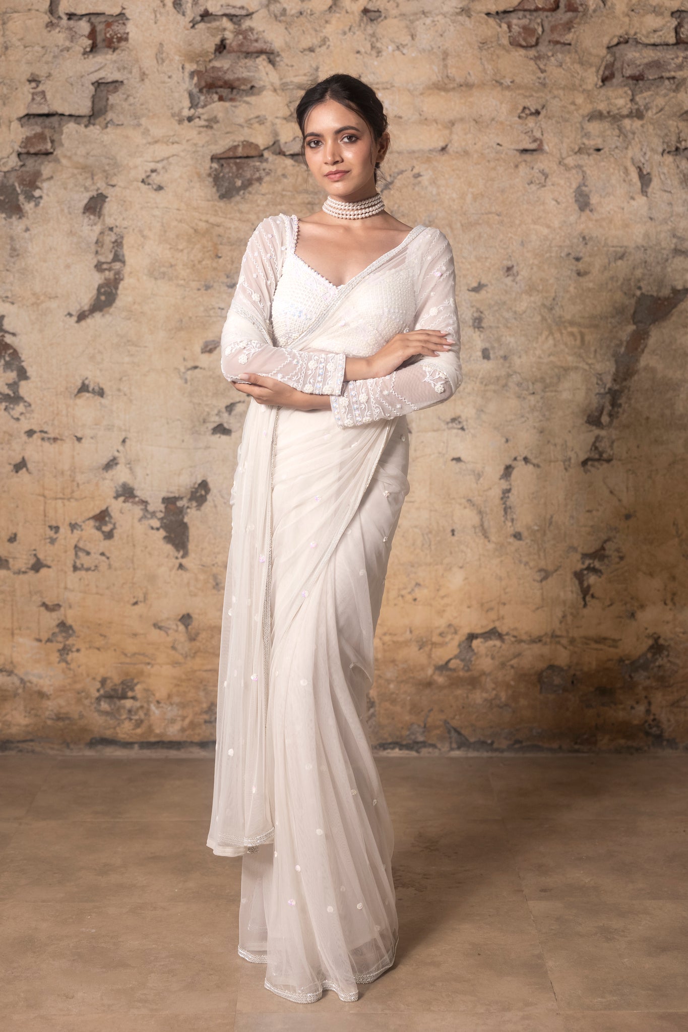 Delicately hand embroidered blouse with hand embroidered pre pleated saree