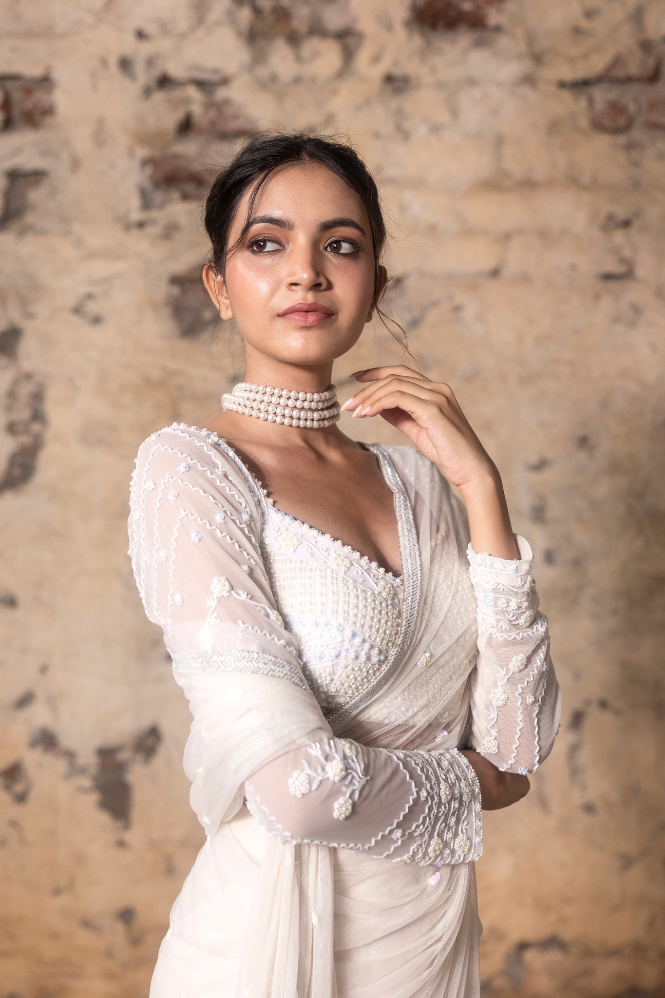 Delicately hand embroidered blouse with hand embroidered pre pleated saree