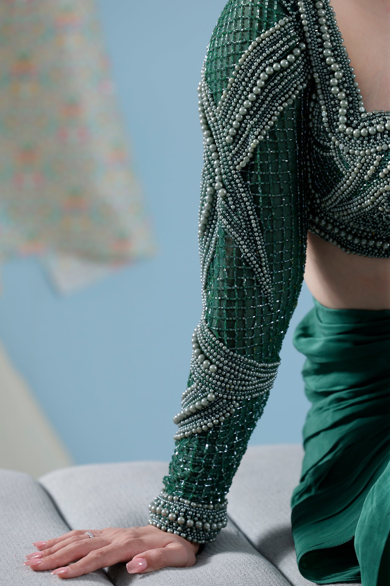 Green pre draped saree with heavy hand embroidered blouse