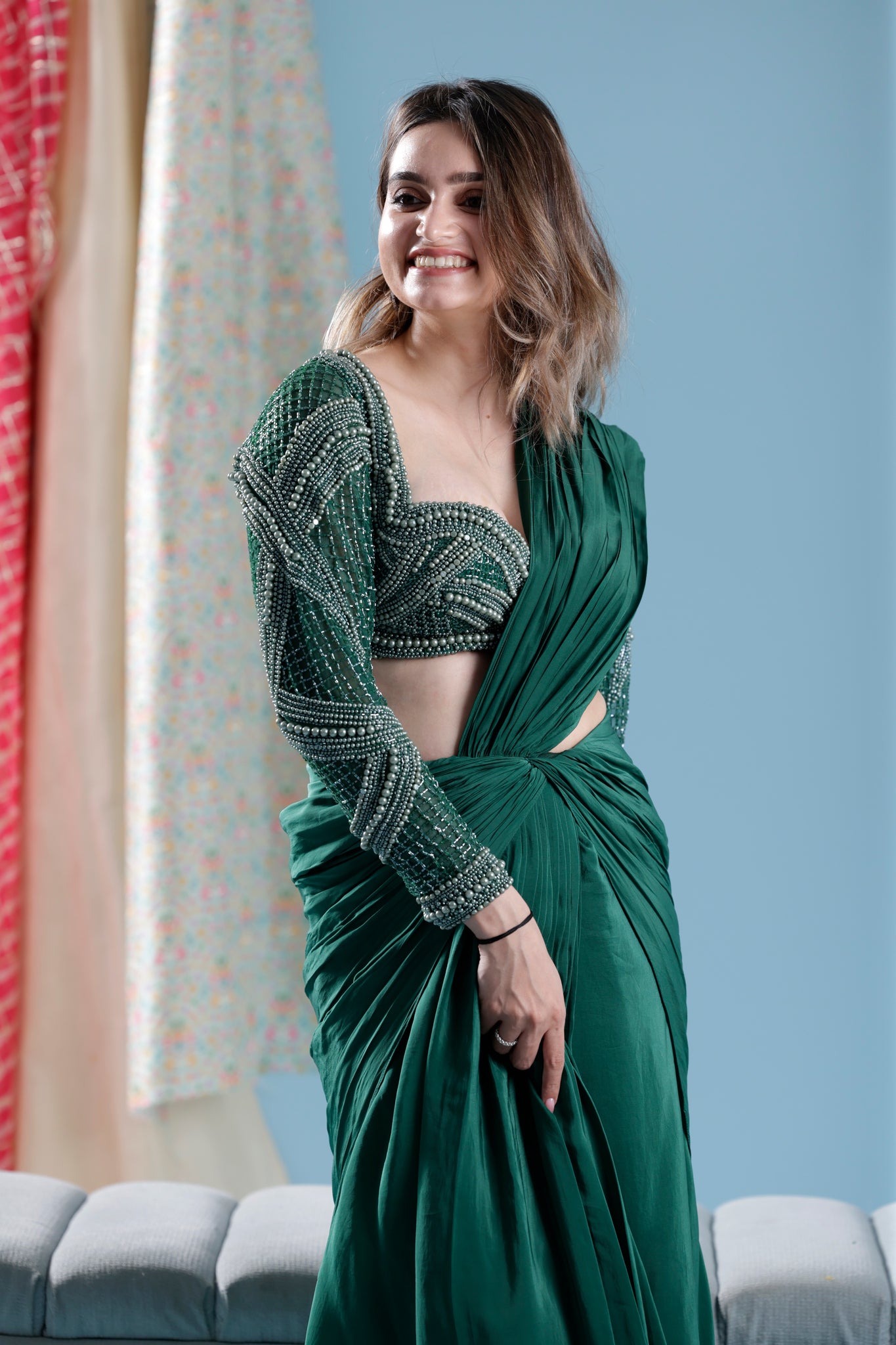 Green pre draped saree with heavy hand embroidered blouse