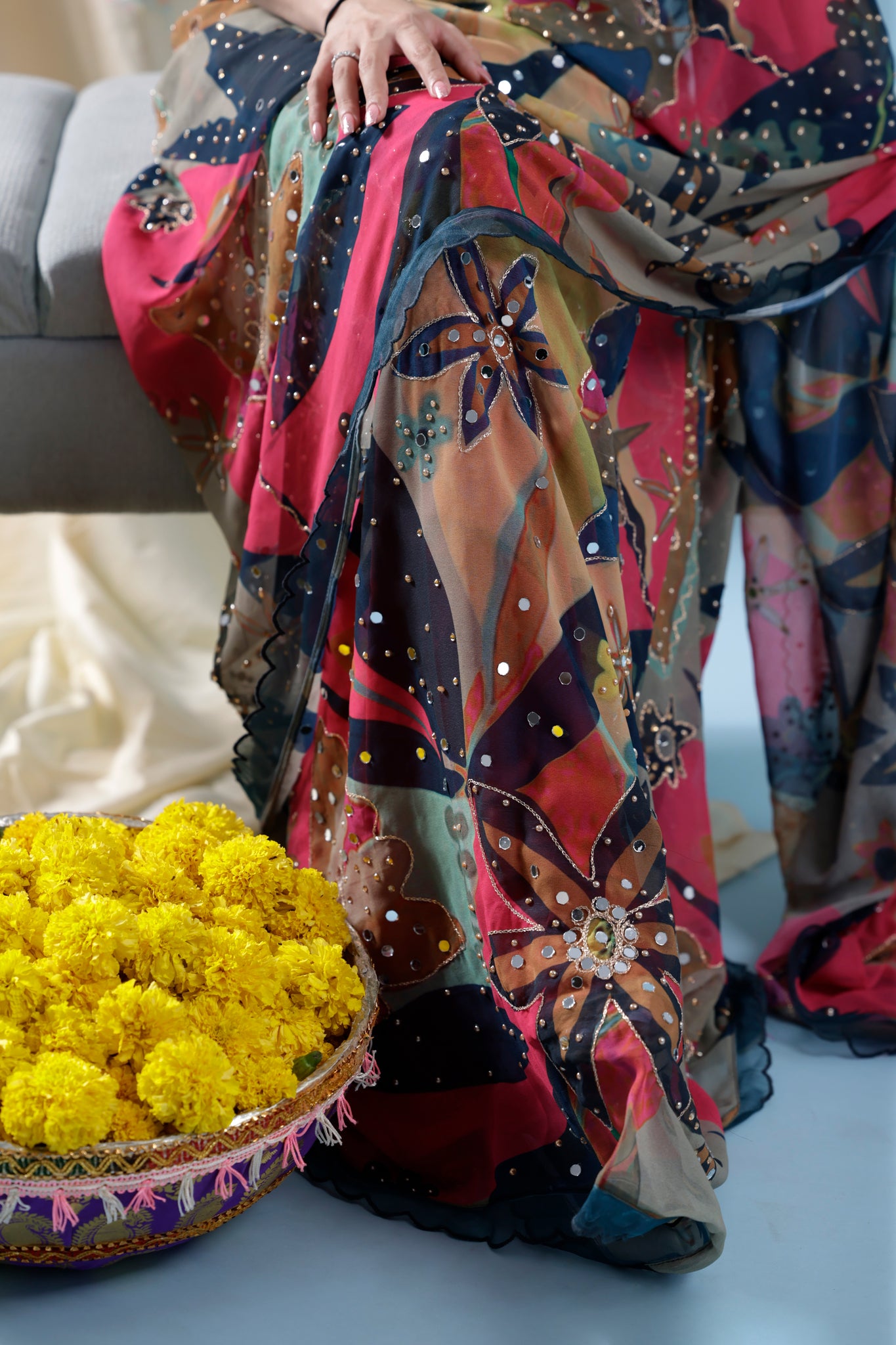 Leaf printed saree with sleeveless blouse