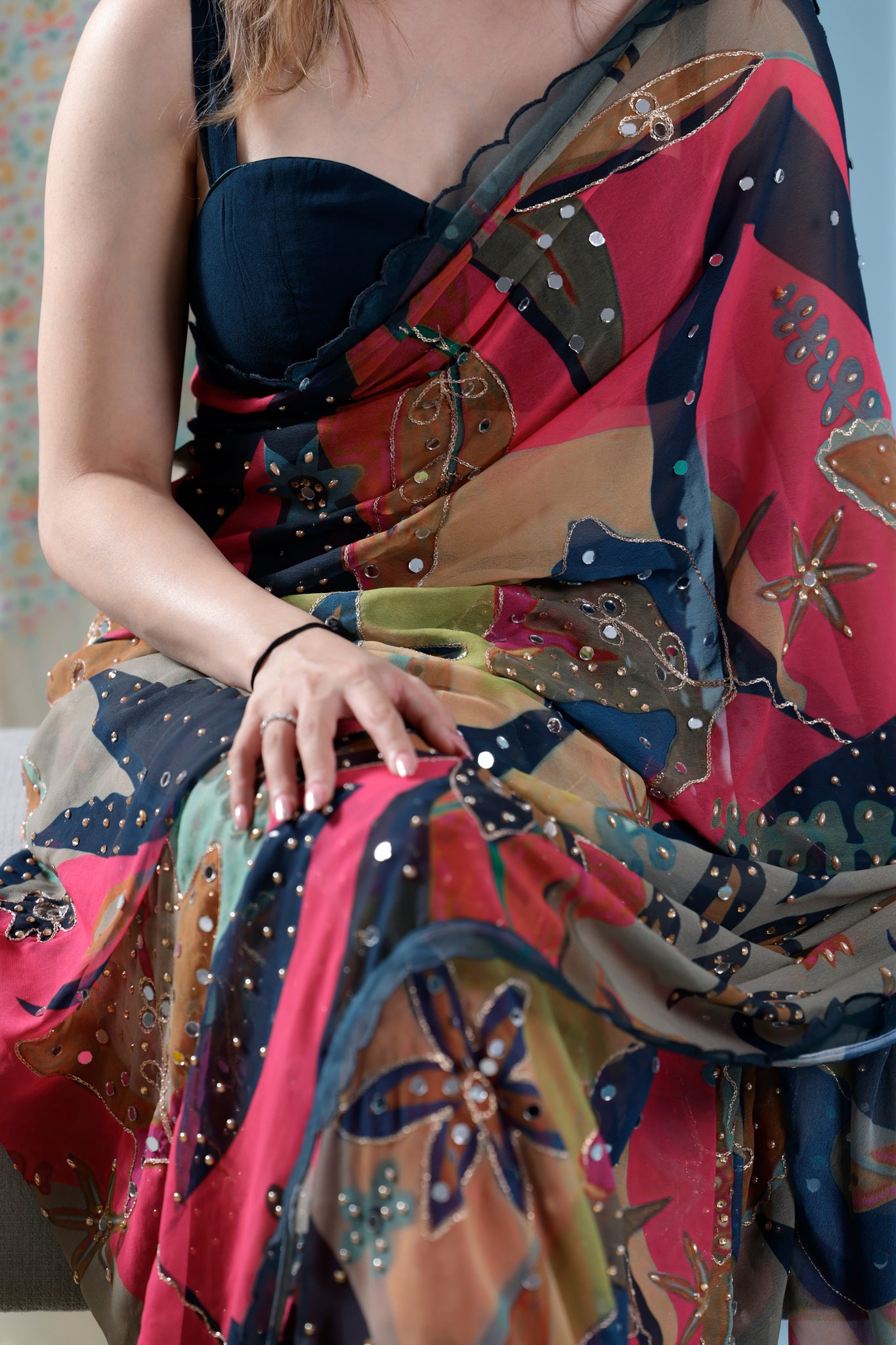 Leaf printed saree with sleeveless blouse