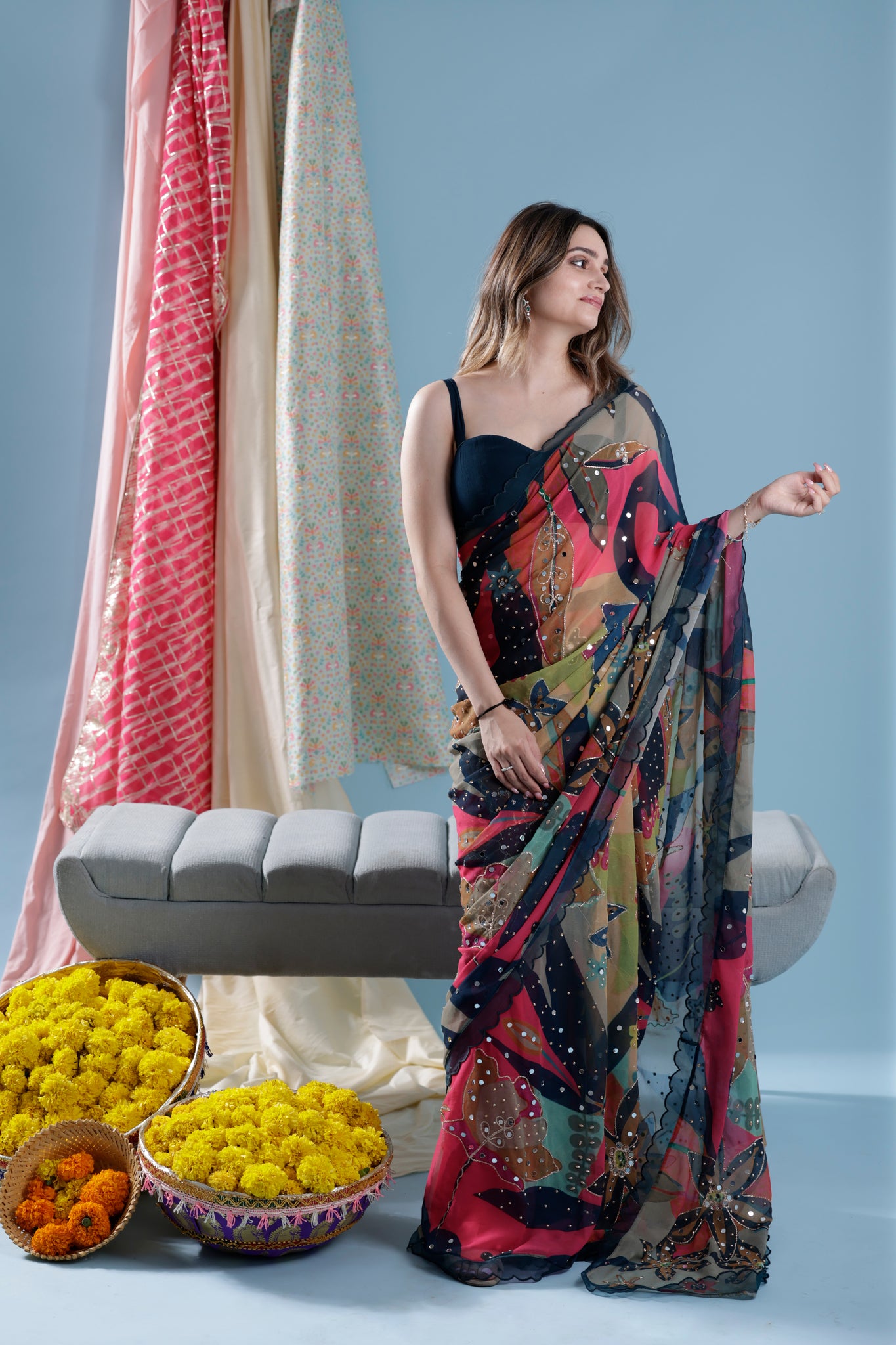 Leaf printed saree with sleeveless blouse