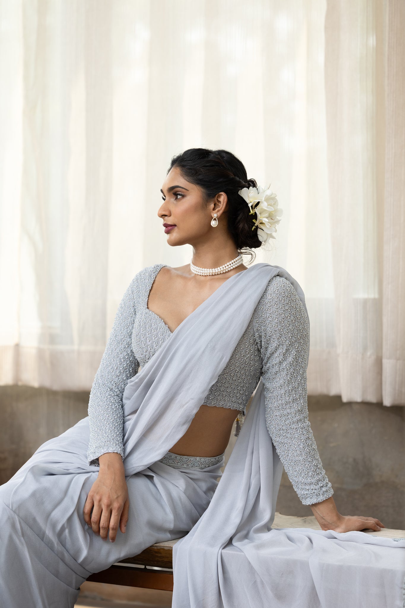 Blue Pre-draped Saree with fully hand embroidered pearl blouse