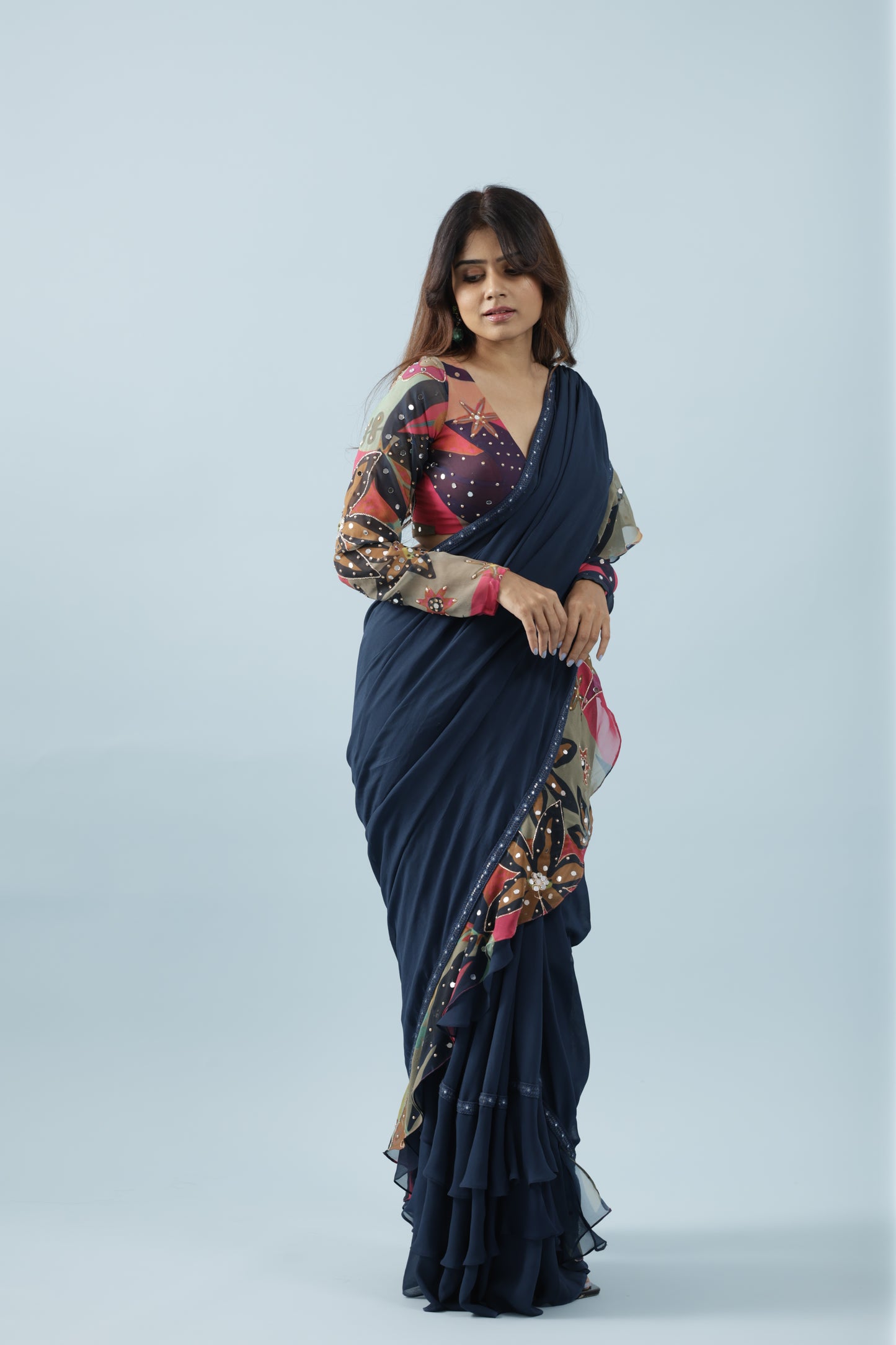 Pre draped saree with printed fabric ruffles and full sleeve blouse