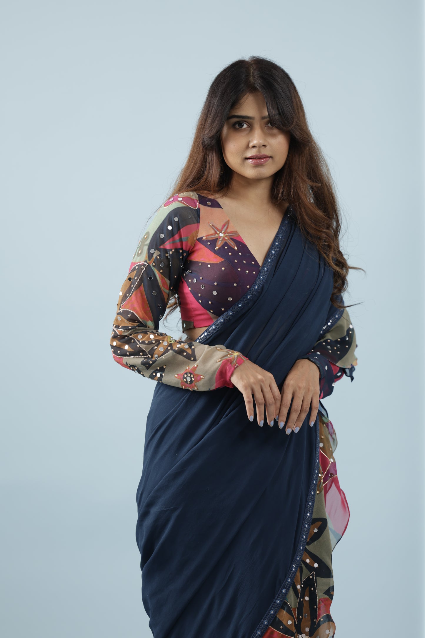 Pre draped saree with printed fabric ruffles and full sleeve blouse