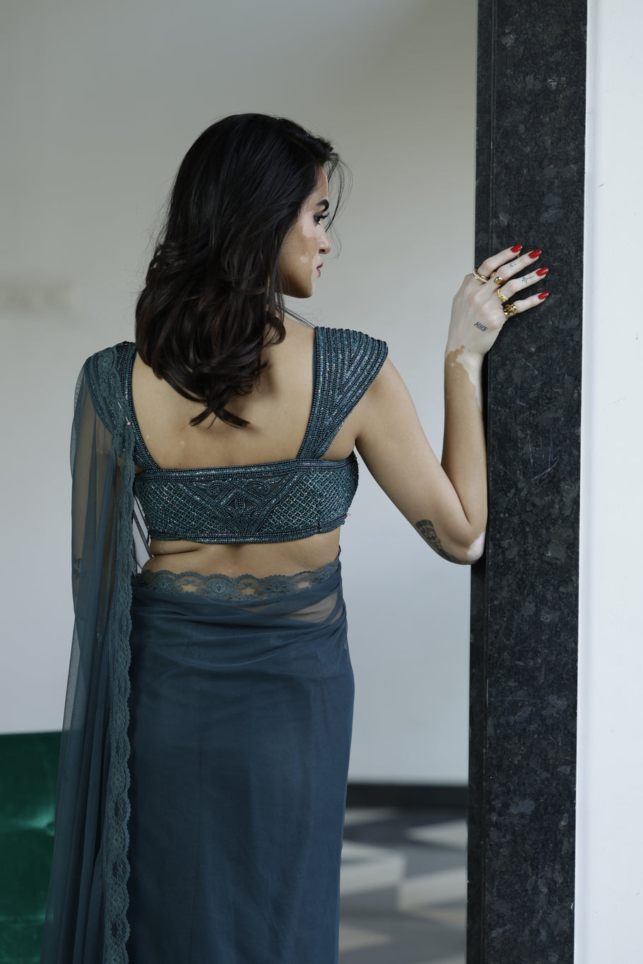 Forest green saree with heavy hand embroidered blouse