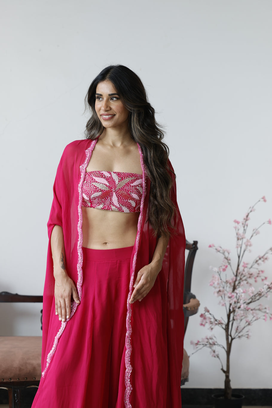 Pink bandeu top with cape and pants